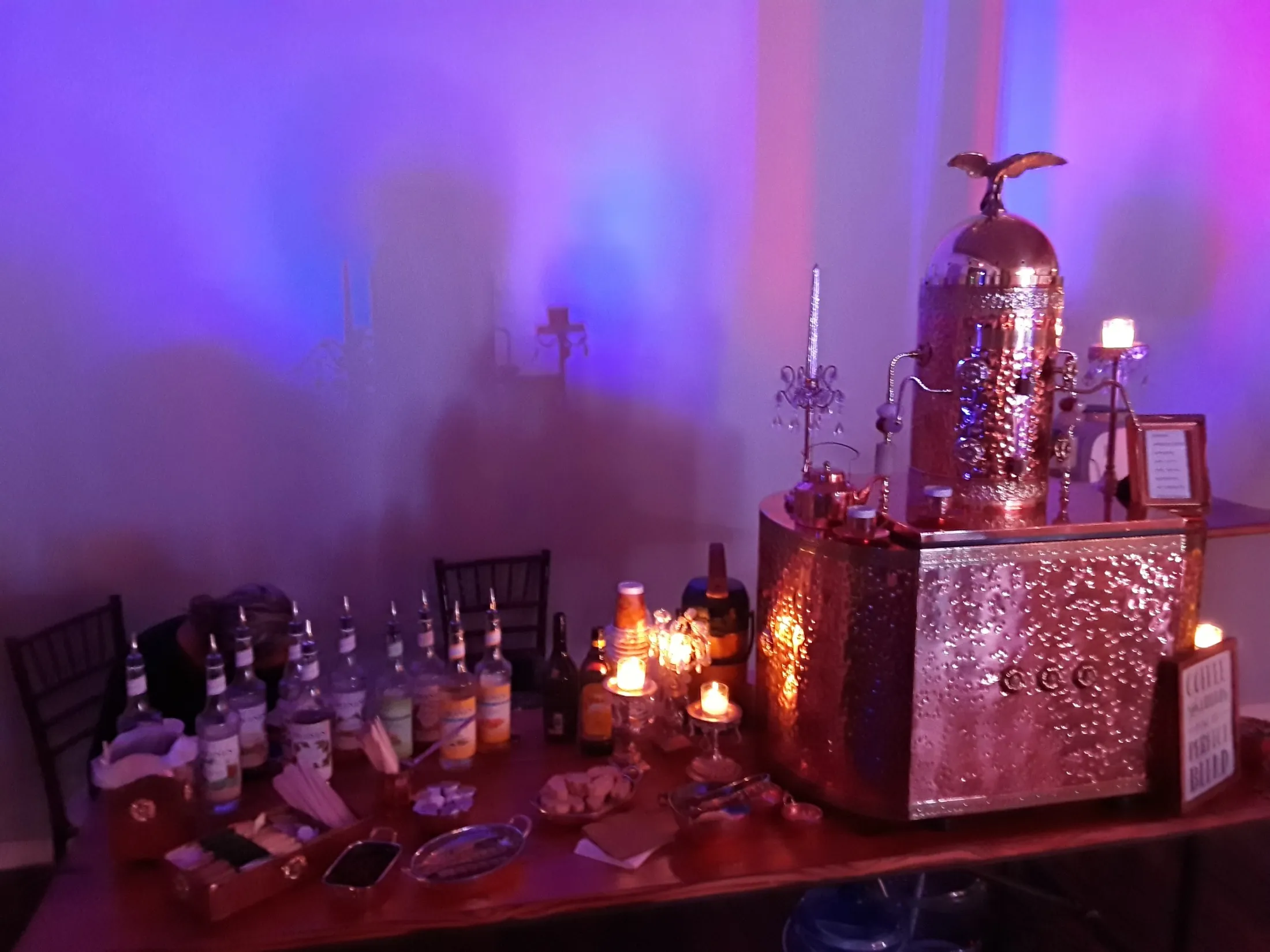 Chic Coffee Events setup under purple event lighting